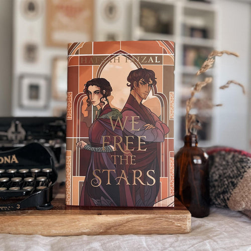 Illumicrate Exclusive: We Free the Stars Hardback Book cover image
