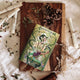 Guardians of Dawn:Ami by S. Jae-Jones front cover on top of a wooden board