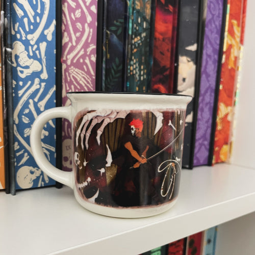 Locked Tomb mug with a design of a skeleton holding a sword on a shelf with colorful books. image