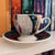 Goddess of Retribution Ceramic Teacup and Saucer image