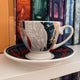 Goddess of Retribution Ceramic Teacup and Saucer