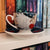 Goddess of Retribution Ceramic Teacup and Saucer image