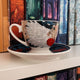 Goddess of Retribution Ceramic Teacup and Saucer
