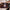 Thumbnail for Iris Kelly Doesn't Date by Ashley Herring Blake on a wooden board with a candle image